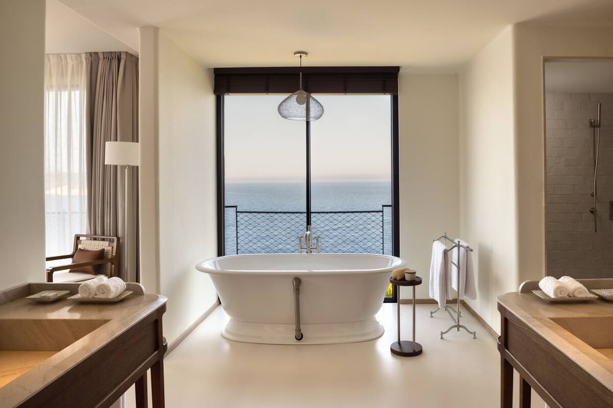 premium suite, 1 bedroom, sea view (seascape) | bathroom | rainfall showerhead, free toiletries, hair dryer, bathrobes