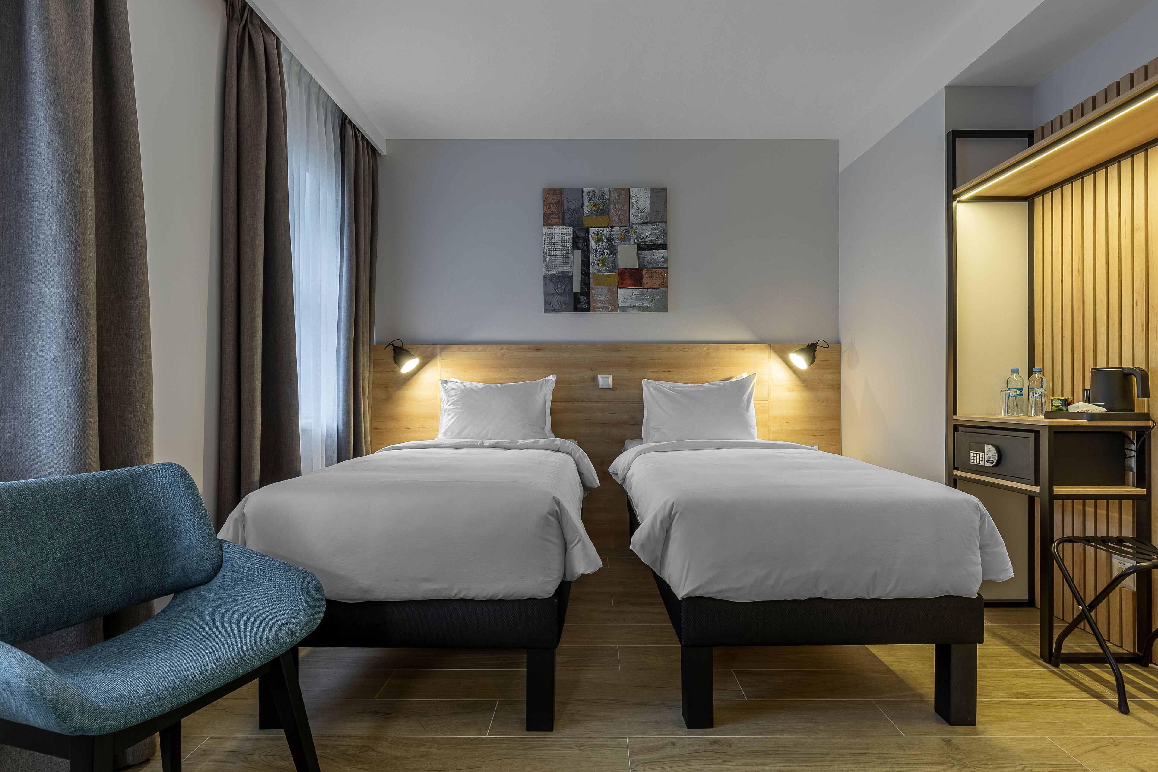 Comfort-Doppel- oder -Zweibettzimmer | Hochwertige Bettwaren, Zimmersafe, Verdunkelungsvorhänge