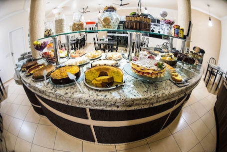 Free daily local cuisine breakfast . Hotel Tito's