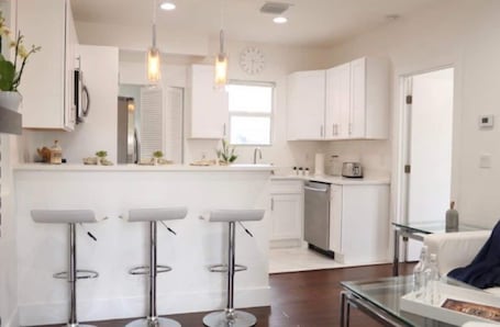 Fridge, microwave, oven, stovetop. Modern Northwood Historic Home