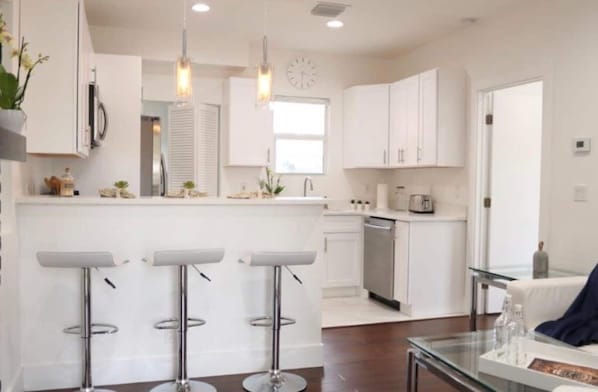 Fridge, microwave, oven, stovetop - Modern Northwood Historic Home (West Palm Beach)