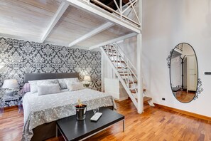 2 dormitorios, caja fuerte, tabla de planchar con plancha