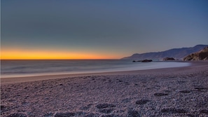 Beach nearby, sun loungers