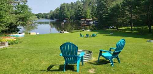 Cabin on the Eagle River Chain! Boat dock slip! Kayaks! Firewood for bonfires!