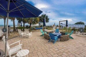 Outdoor dining - Towers on the Grove Cherry Grove 2 bed/2 baths condo.  30 steps to the beach (North Myrtle Beach)