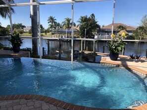 Outdoor pool, an infinity pool - Luxury Home with Waterfront View (Cape Coral)