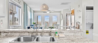 Lower Waterfront Condo with Oceanfront Balcony, Shared Outdoor Pool, WiFi & AC
