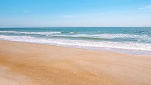 A beach with a clear sky and calm sea. - Ocean view, 2BR, 2BA Condo, St. Regis #3213, Topsail, NC (North Topsail Beach)