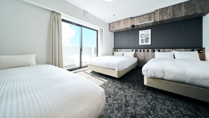 A hotel room with two beds, a large window with curtains, a ceiling light, and a wall-mounted artwork. - Grand STAY Hakata Station North (Fukuoka)