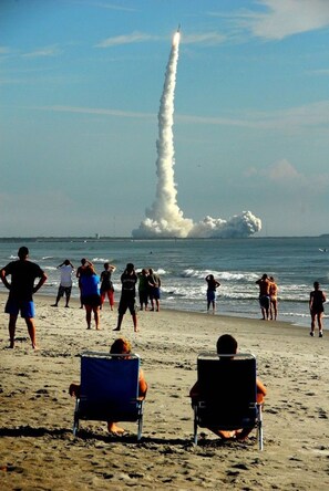 On the beach, sun-loungers, beach towels