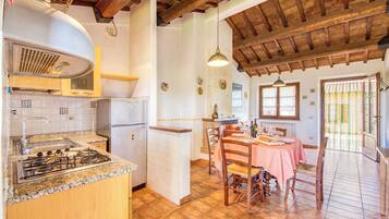 Fridge, stovetop, espresso maker, cookware/dishes/utensils