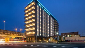 A multi-story hotel with a prominent sign reading "HOTEL ROUTE INN". - Route Inn Noda - Kokudou16gouzoi - (Noda)