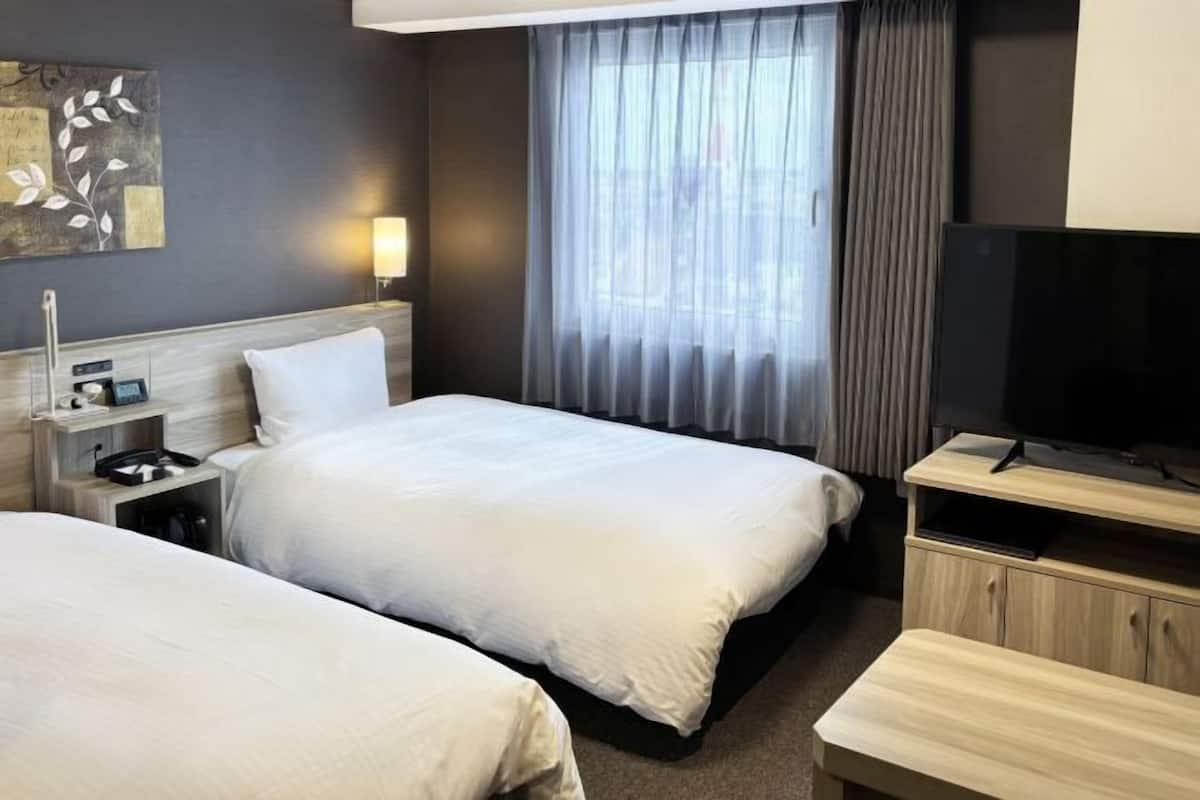 1 quarto, Wi-Fi de cortesia, roupa de cama