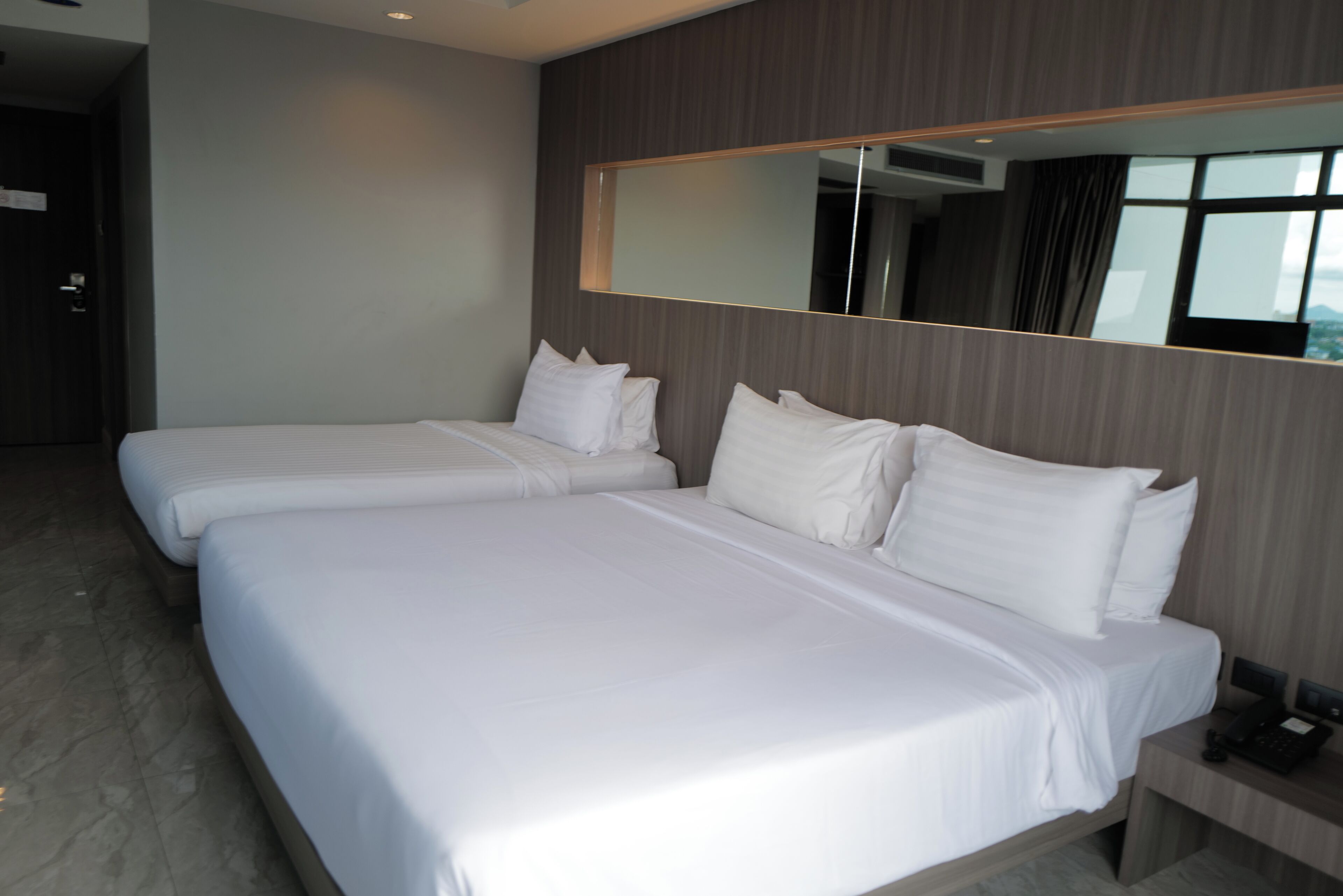 Executive Ocean Triple Deluxe Room | Premium bedding, pillow-top beds, free minibar items, blackout curtains