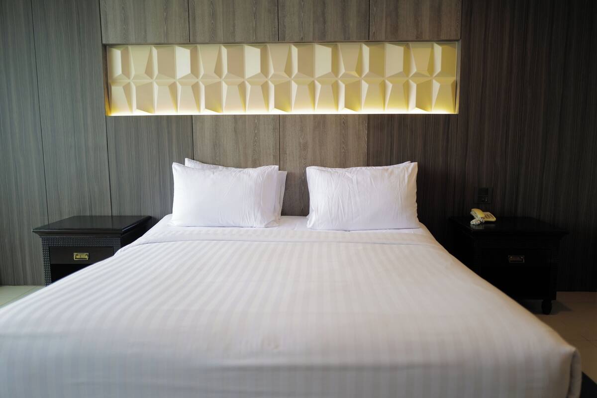 Urban King Room | Premium bedding, pillow-top beds, free minibar items, blackout curtains