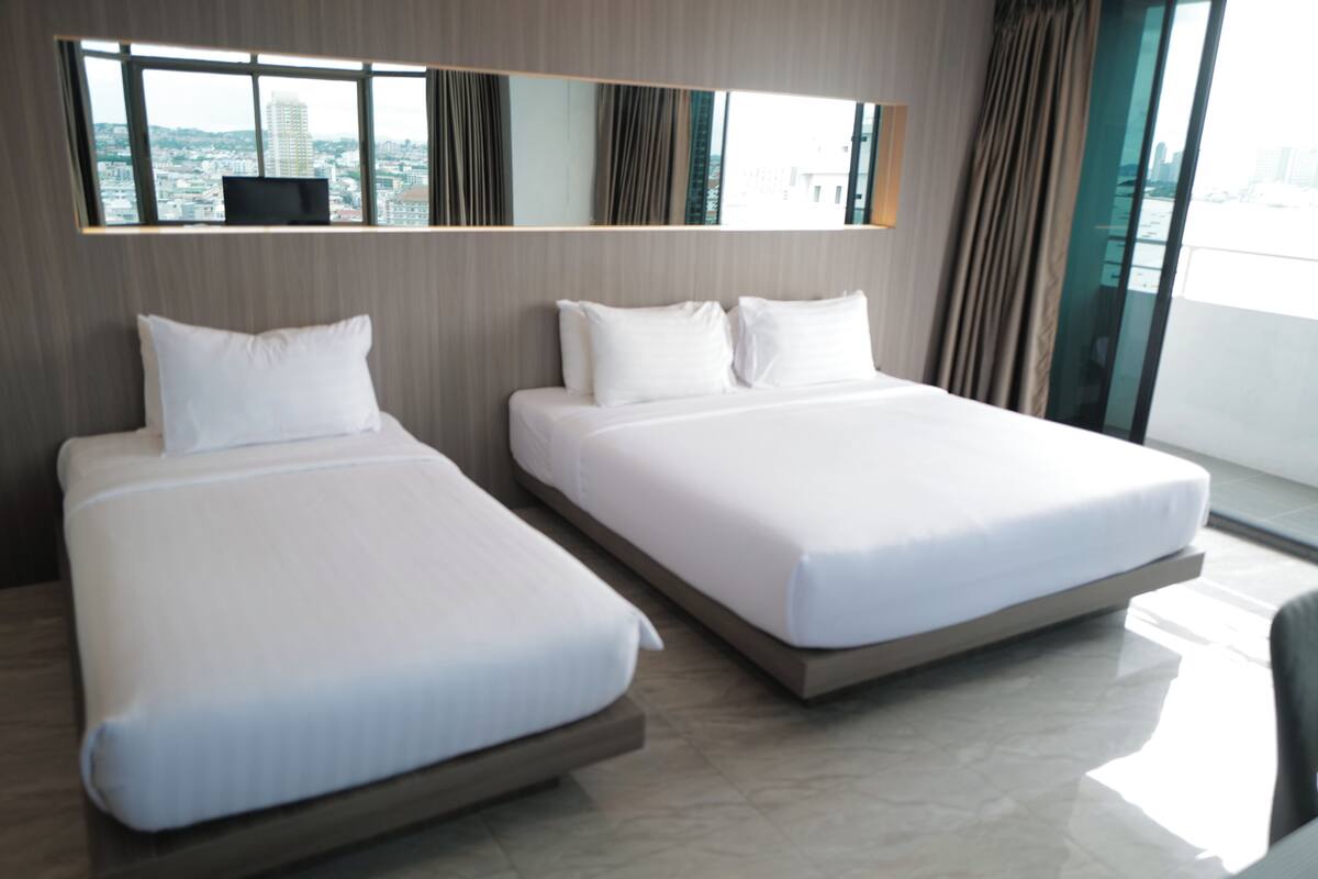 Premium bedding, pillow-top beds, free minibar items, blackout curtains