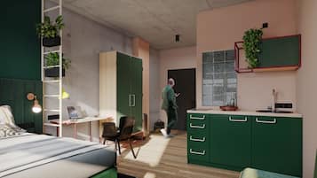 Ein modernes Schlafzimmer mit einem Bett, Schreibtisch und einem grünen Kleiderschrank.