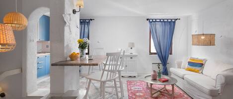 Signature Apartment | Living area | Flat-screen TV