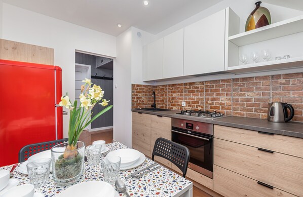 Apartment, 1 Bedroom, Terrace | Private kitchen | Oven, dishwasher, coffee/tea maker, electric kettle