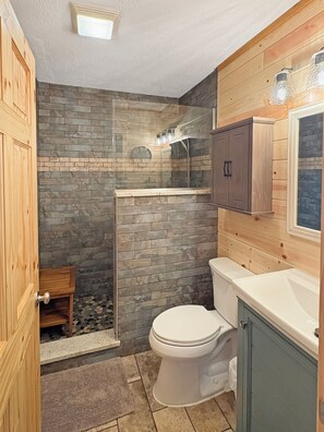 Bathtub, hair dryer, towels, soap