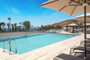 Indoor pool, seasonal outdoor pool, free pool cabanas, pool umbrellas