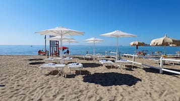 Private beach, sun-loungers, beach umbrellas, beach towels