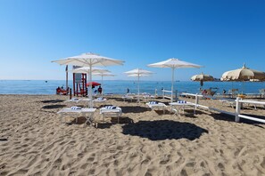 Private beach, sun loungers, beach umbrellas, beach towels