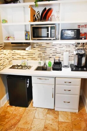 Fridge, microwave, stovetop, coffee/tea maker