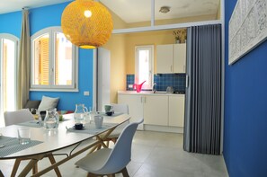 Apartment | Private kitchen | Full-size fridge, stovetop, electric kettle, cookware/dishes/utensils