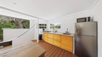 Fridge, microwave, stovetop, coffee/tea maker