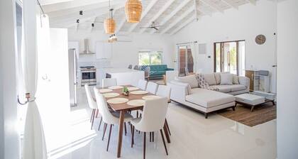 Modern 4BR oasis on 1 acre, 1 min from stunning Leeward Beach