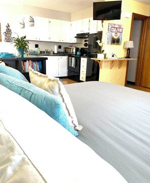 Iron/ironing board, travel crib, free WiFi, bed sheets