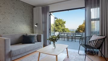Luxury Suite, 1 Bedroom, Non Smoking, City View | Living area | Smart TV, Netflix, DVD player, streaming services