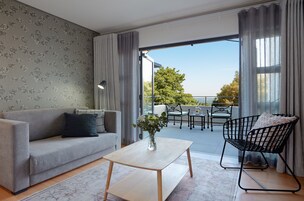 奢华套房, 1 间卧室, 无烟房, 城市景观 | 起居区 | 智能电视、Netflix、DVD 播放器、流媒体服务