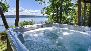 A hot tub with a view of a lake and mountains. - Bonskeid House: Relaxing Seneca Lake Getaway! (Dundee)