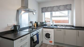 Bungalow Supérieur, salle de bains privée, vue mer | Cuisine privée