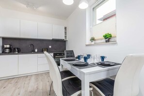 Fridge, oven, stovetop, coffee/tea maker - Comfortable Apartment with Balcony | Parking in Garage (Kolobrzeg)