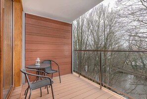 Outdoor dining - Bright Apartment with Balcony | Parking | Close to the River (Kolobrzeg)