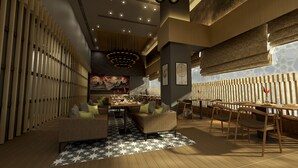 Un interior de restaurante moderno con un área central de comedor, asientos acolchados y un piso estampado.