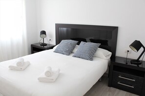 1 dormitorio, tabla de planchar con plancha, wifi gratis y ropa de cama