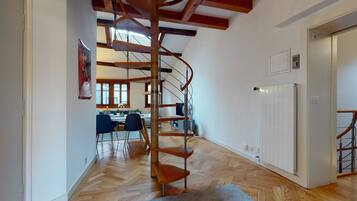 Basic Apartment, Multiple Beds | Living room | TV