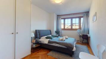 Basic Apartment, Multiple Beds | 2 bedrooms, laptop workspace, iron/ironing board, bed sheets