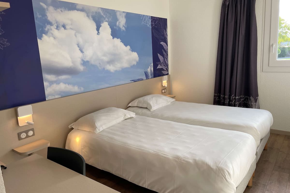standard room, 2 single beds | memory-foam beds, desk, laptop workspace, blackout curtains