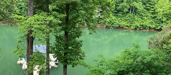 NEW Listing! LAKEFRONT COZY with fire pit and dock! NEW internet