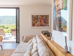 TV, fireplace, books, offices