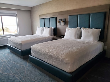 Hypo-allergenic bedding, blackout drapes, iron/ironing board, free WiFi