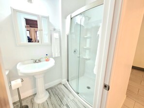 Hair dryer, towels, soap, shampoo