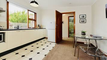 Fridge, microwave, toaster, cookware/dishes/utensils