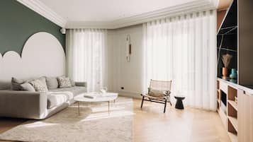 65-inch flat-screen TV with cable channels, fireplace, Netflix