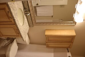 Bathtub, hair dryer, towels